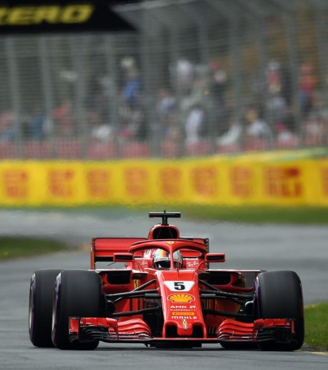 Vettel conquistou seu 100º pódio na carreira neste domingo ( (Foto: Saeed KHAN/AFP)